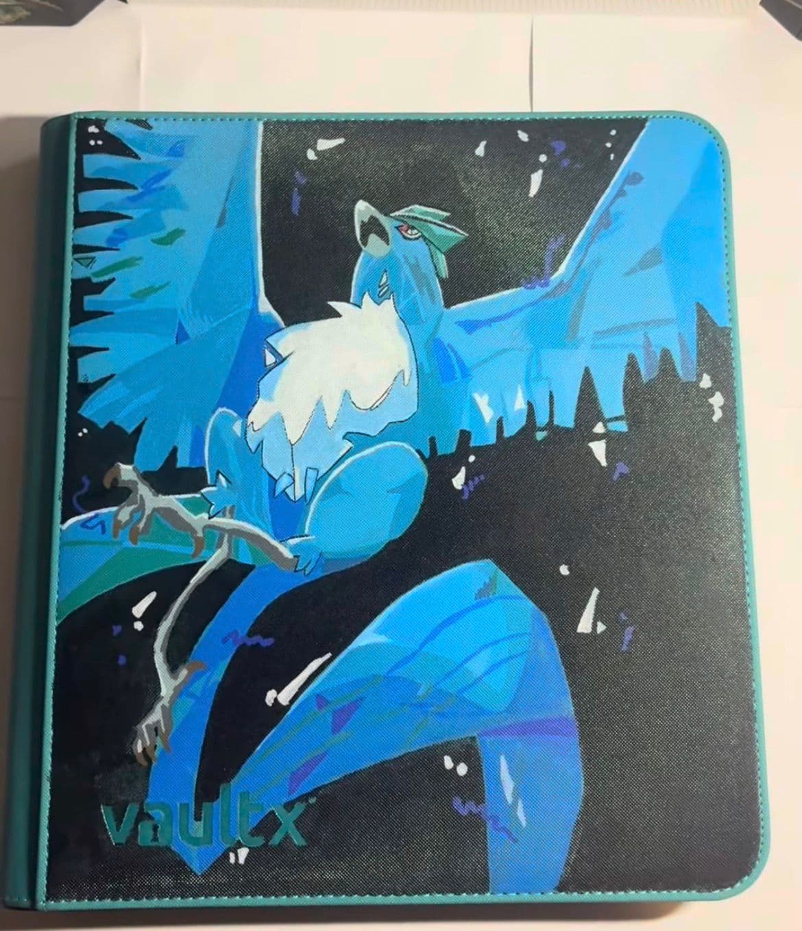 Custom Articuno binder in icy blue tones
