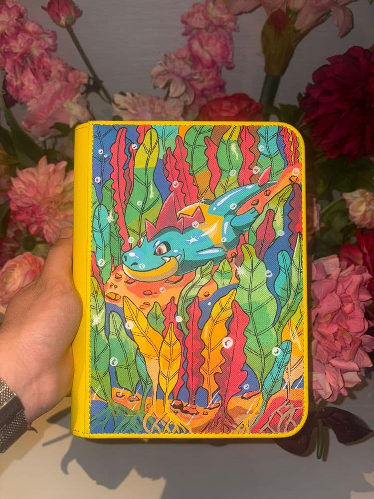 Custom Croconaw binder with a colourful underwater scene among vibrant seaweed