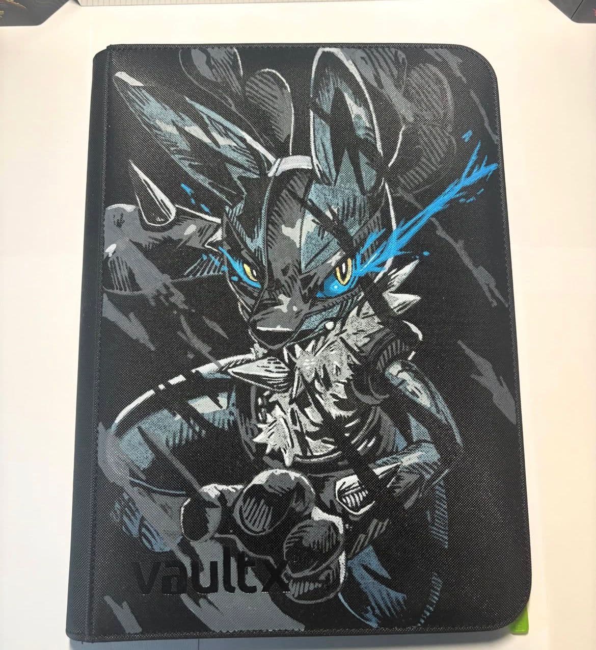 Custom dark Lucario binder with glowing blue accents