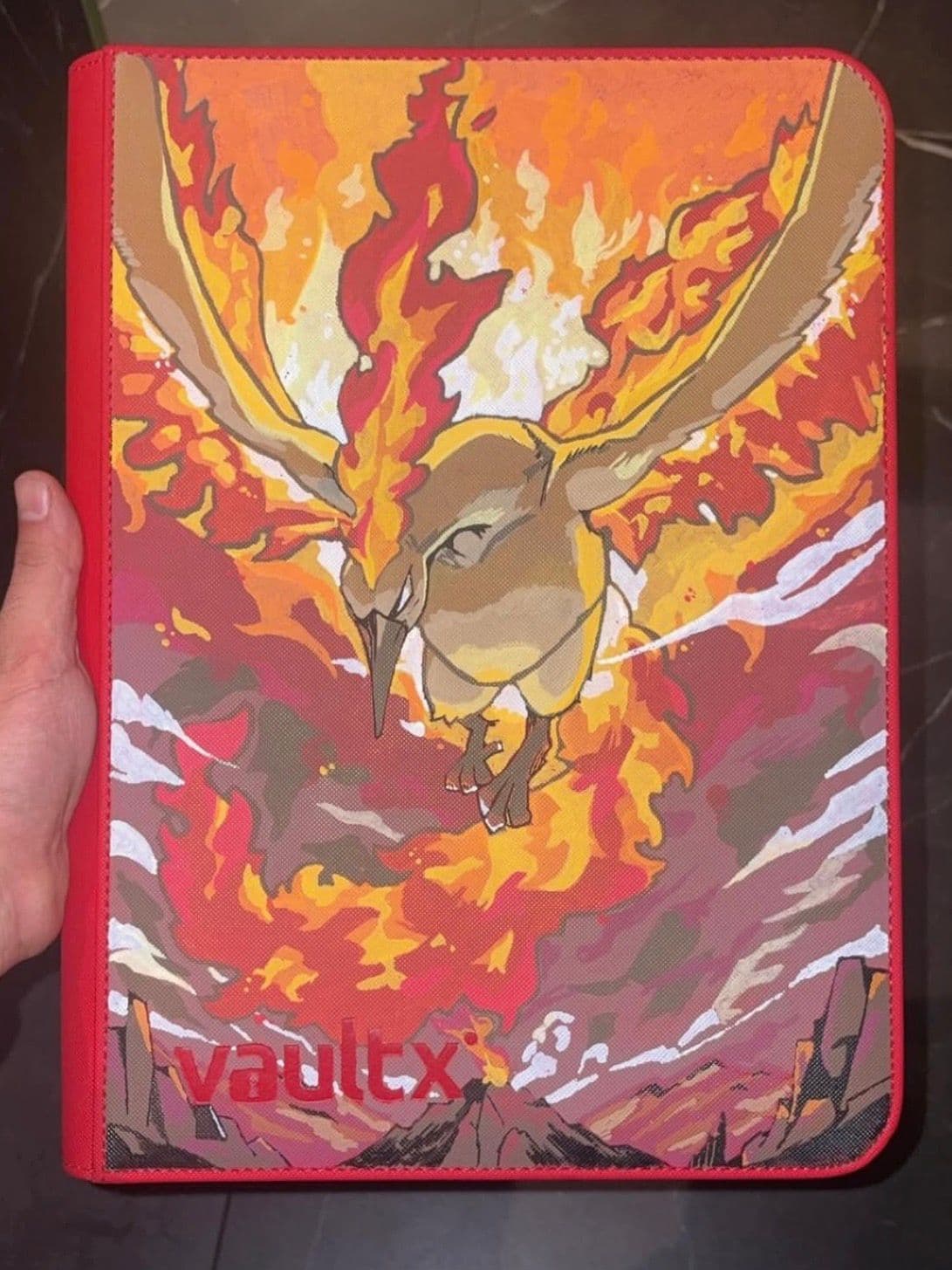 Custom Moltres binder with a blazing fire design
